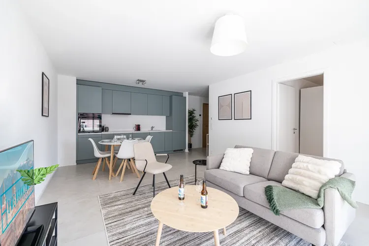 1-bedroom apartment with balcony, bright and modern, in a contemporary residence, featuring an equipped kitchen, designer bathroom, and integrated smart home system. Interior 1