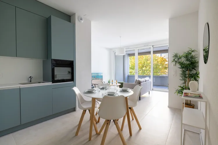 1-bedroom apartment with balcony, bright and modern, in a contemporary residence, featuring an equipped kitchen, designer bathroom, and integrated smart home system.